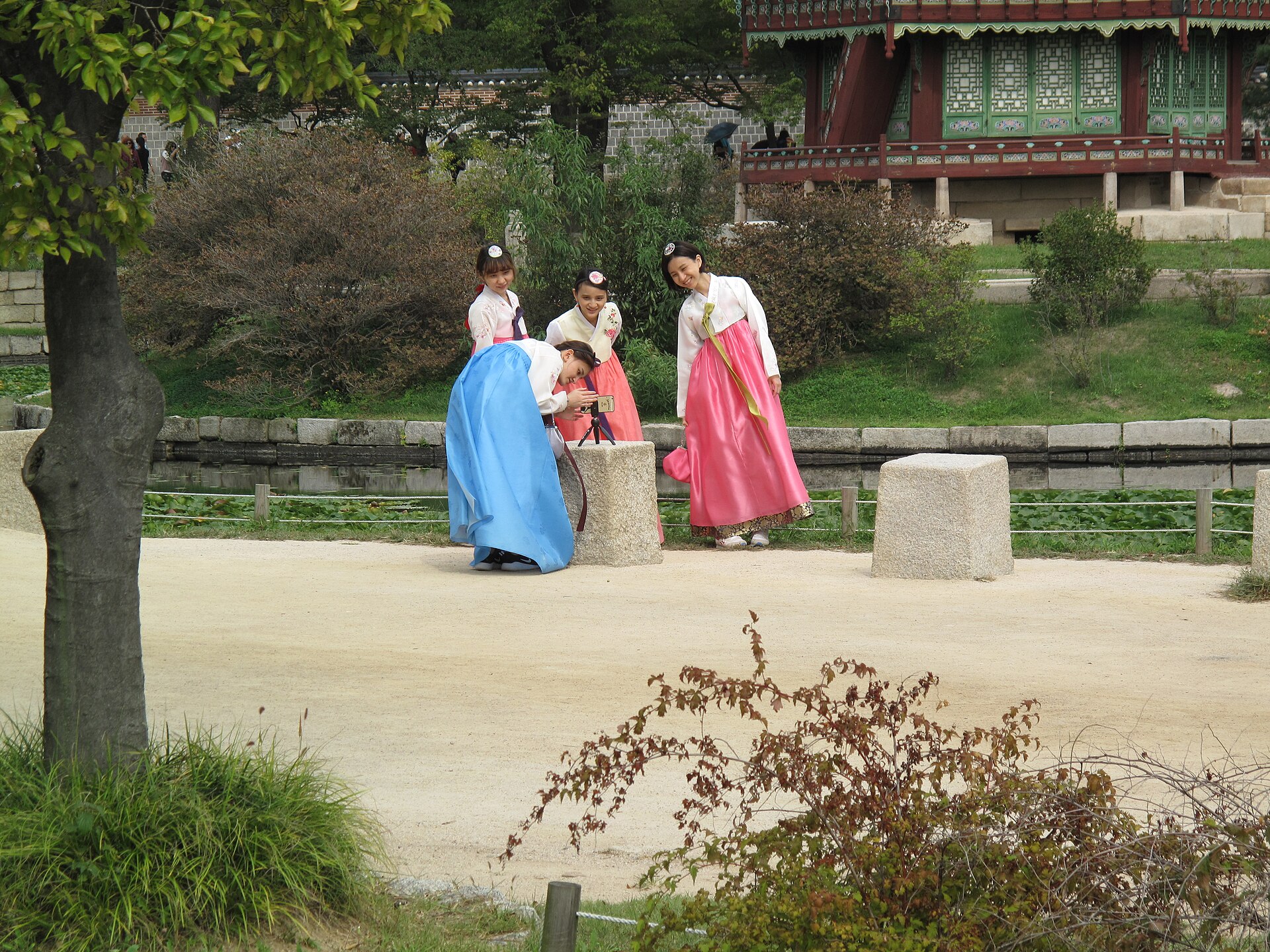 Visitors in rented hanbok at Gyeongbokgung Palace