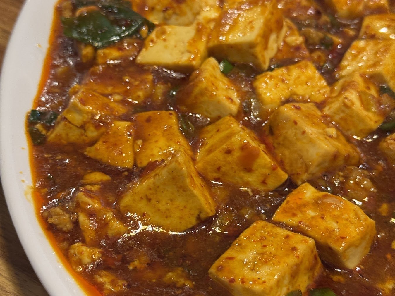 泛著紅油的一盤麻婆豆腐