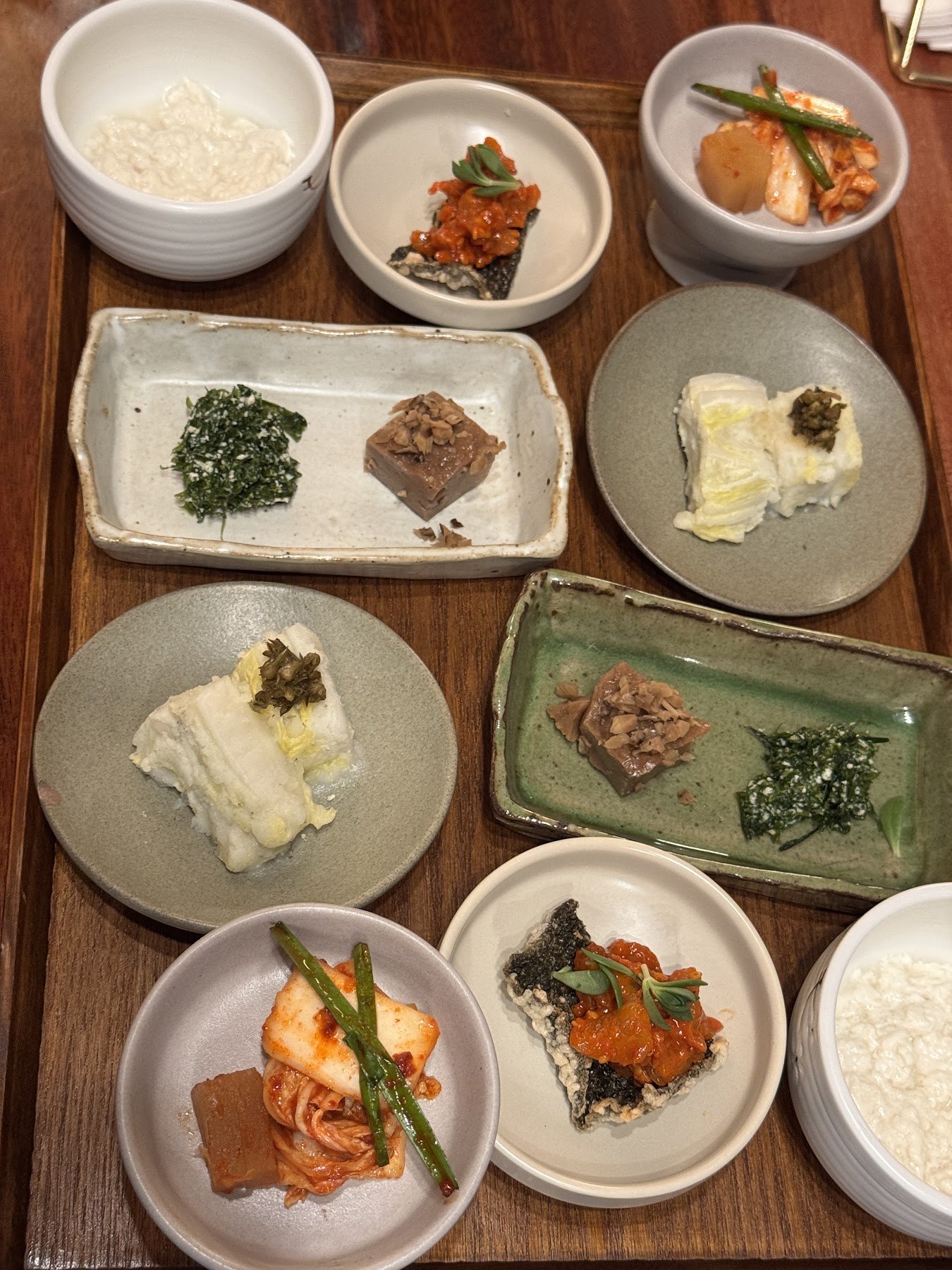 The table at Eolssu Bistro set with rice, side dishes and main plates