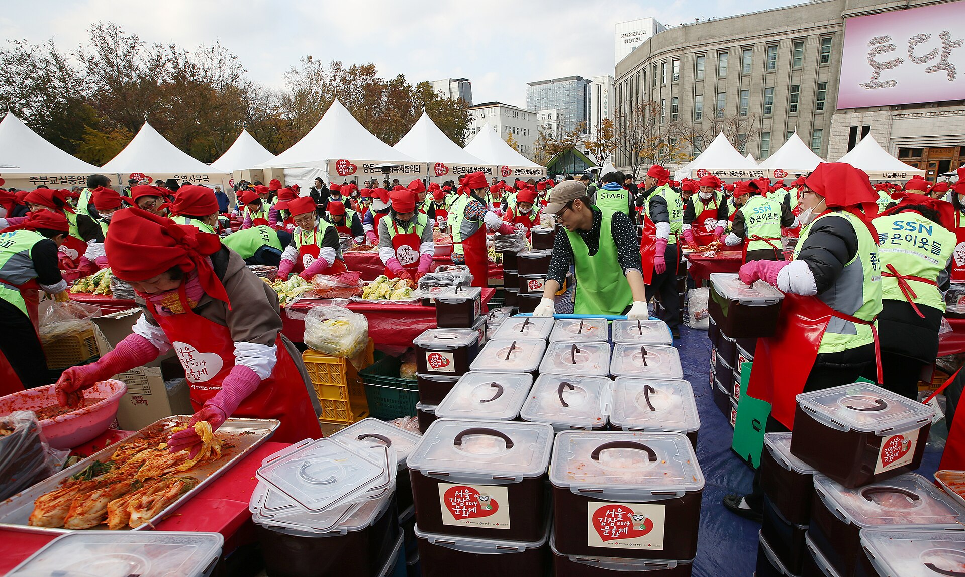 Participants making kimchi together at the Seoul Kimchi Festival, Seoul Plaza