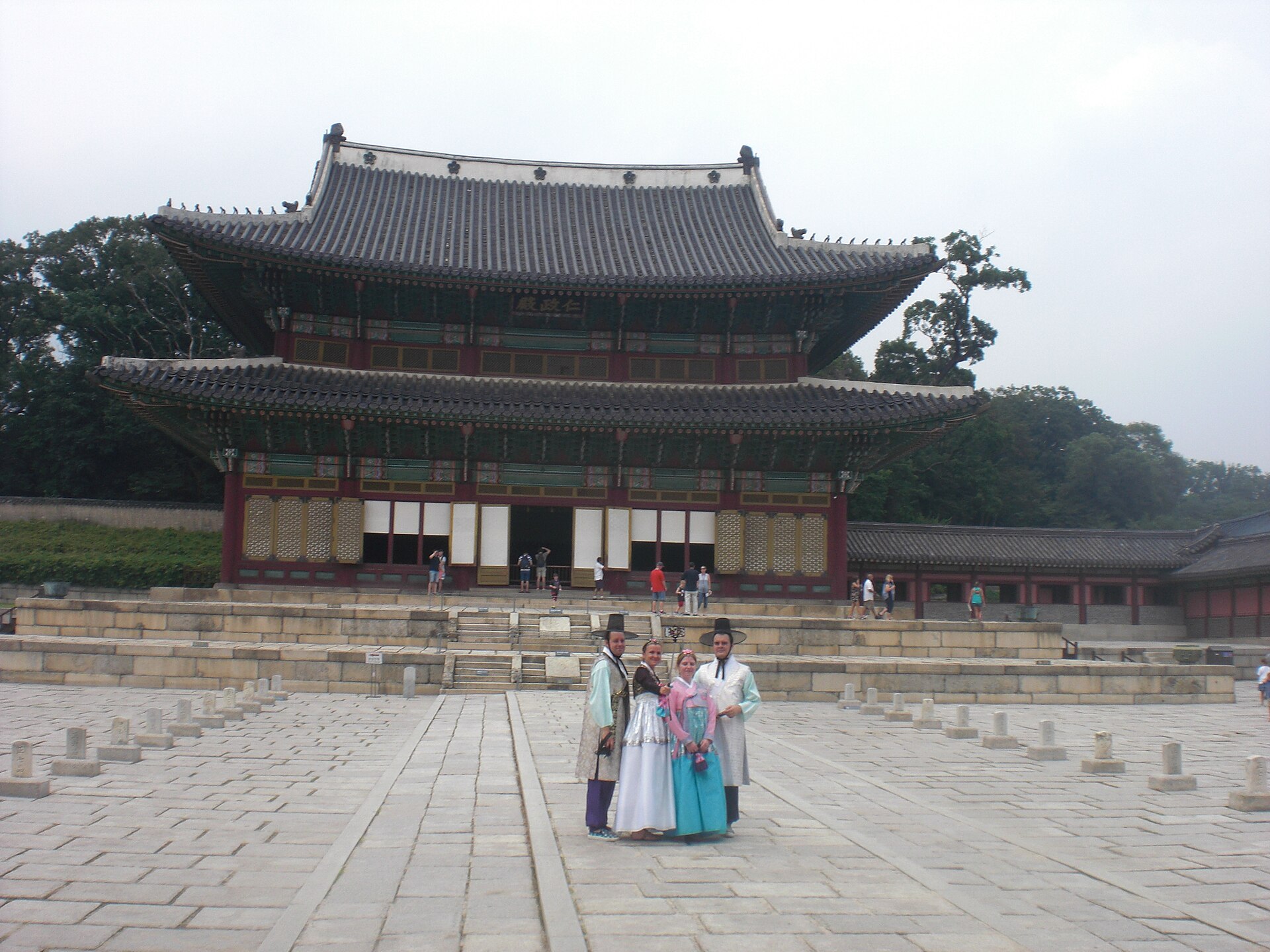 Visitors in hanbok walking through Changdeokgung