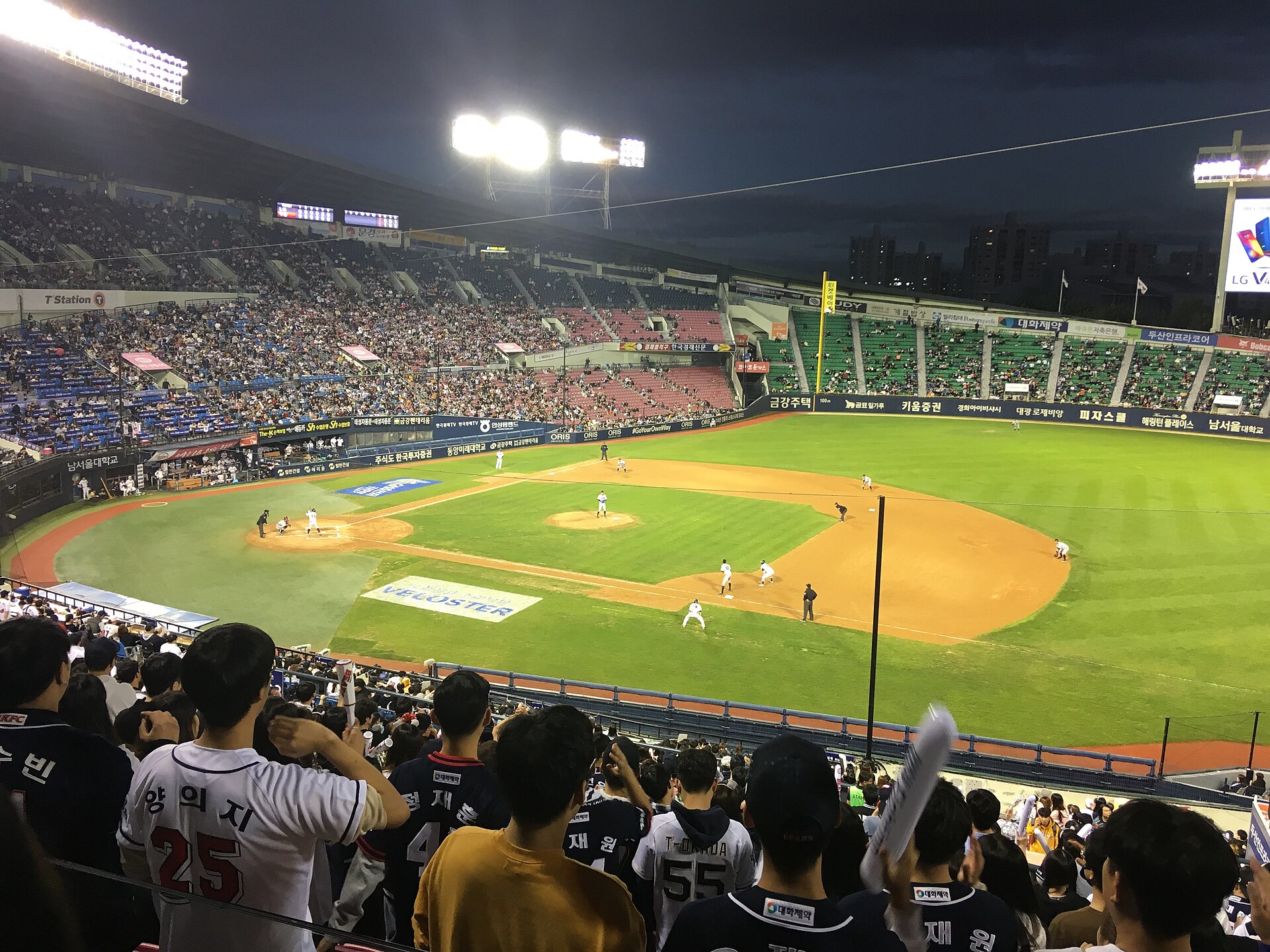 The field and stands at Jamsil during a night game