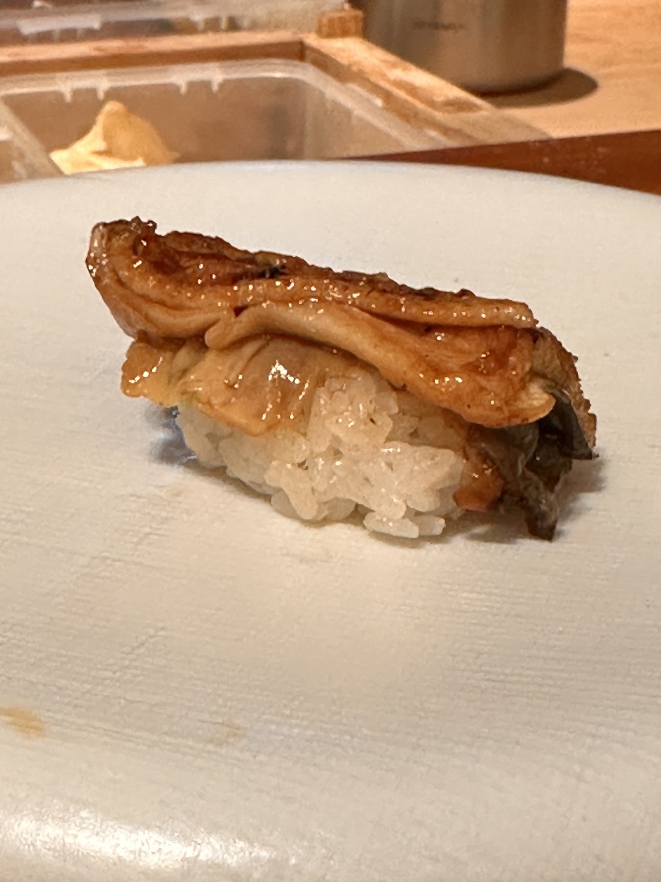 A conger eel nigiri brushed with tare