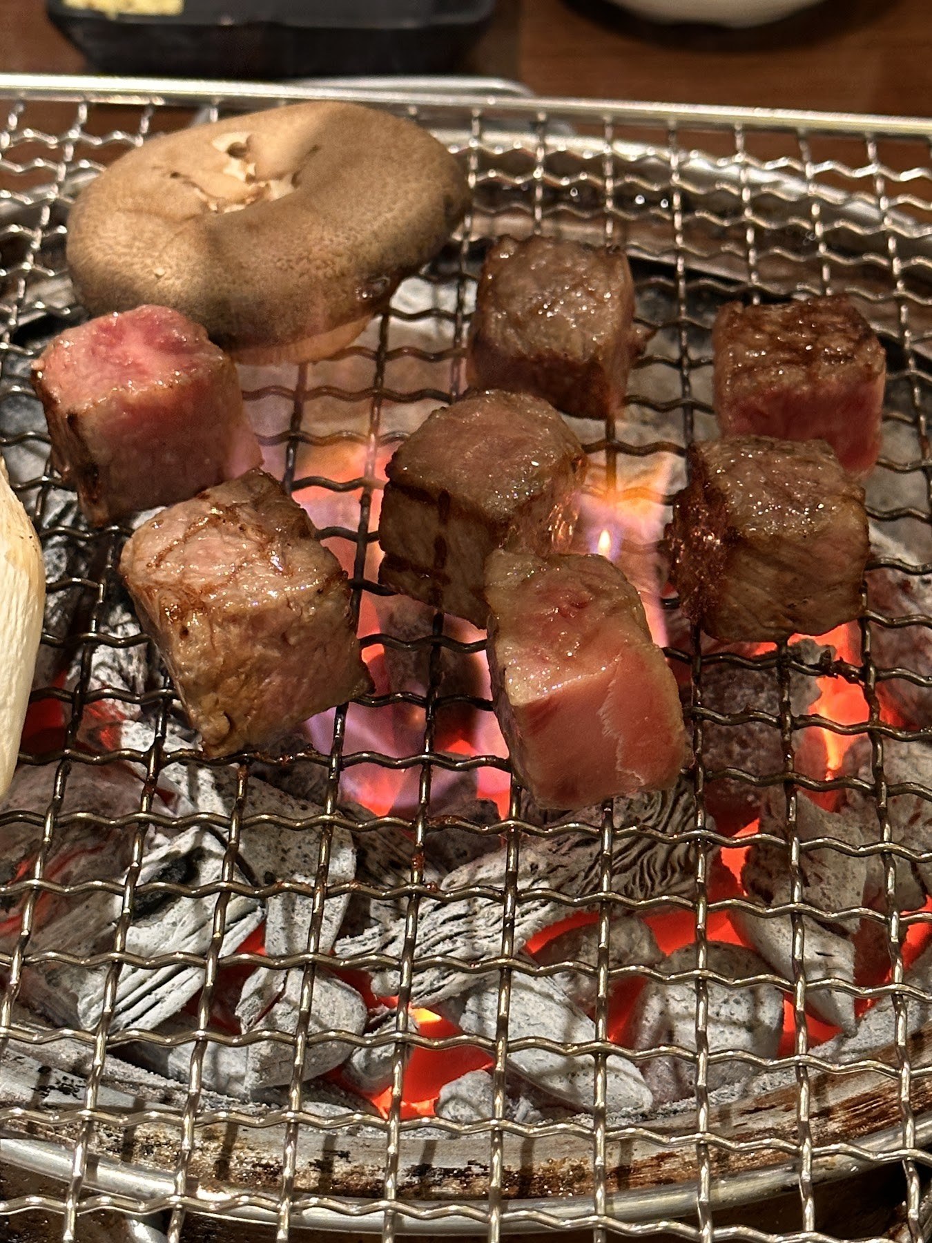 Charcoal brought to the table in its brazier